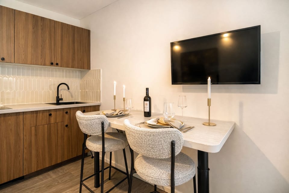 Standard Studio, Courtyard View | Living area | 80-cm Smart TV with digital channels