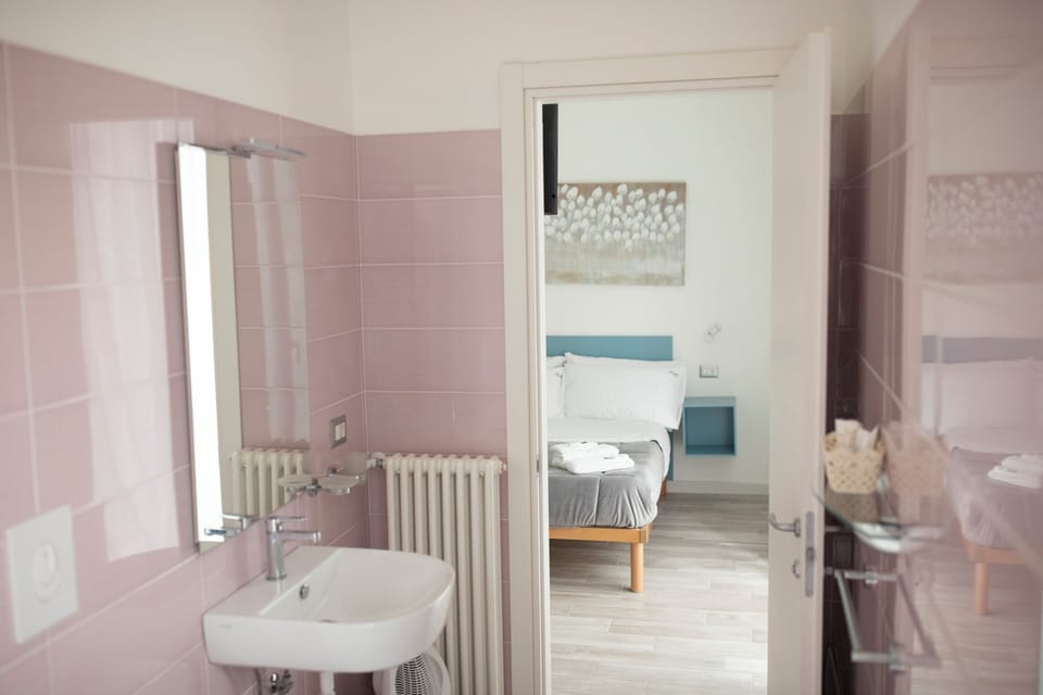 Superior Double Room, Balcony, City View | Bathroom | Shower, hair dryer, towels, soap