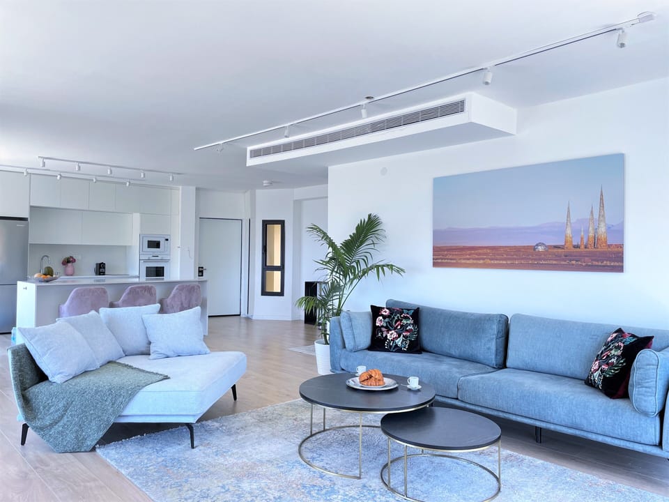 Luxury Penthouse, Sea View | Living area | 127-cm Smart TV with digital channels