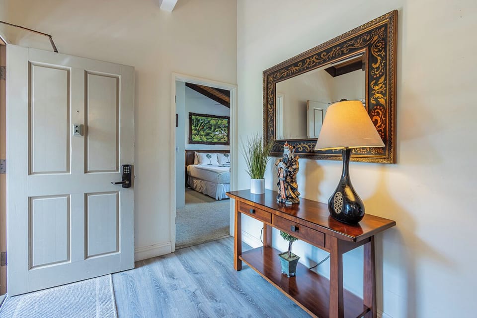 Step into a welcoming entryway that opens to a bright and comfortable living space, thoughtfully designed to make you feel at home from the moment you arrive.