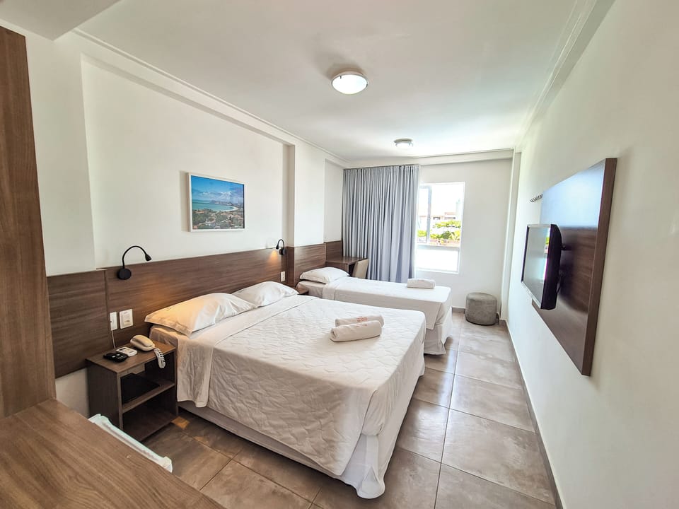 Standard TPL | Minibar, in-room safe, blackout drapes, soundproofing