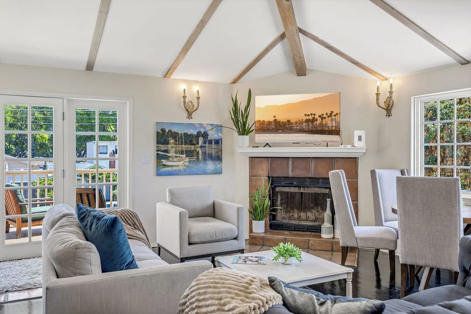 Relax in the open, airy living room after a day of exploring.