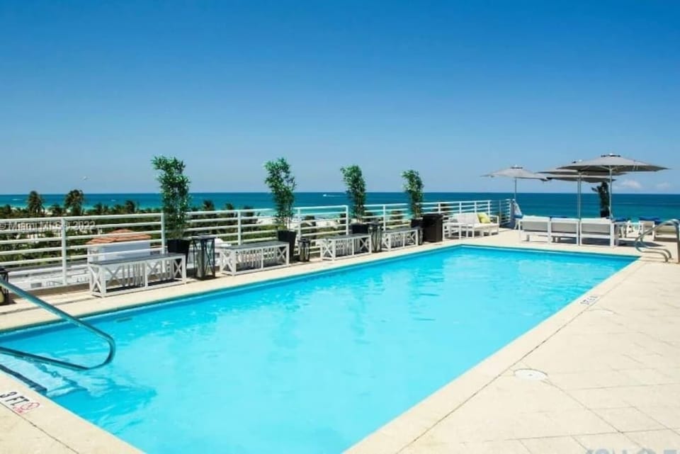 Take a refreshing dip in the inviting shared pool—ideal for sunny days.
