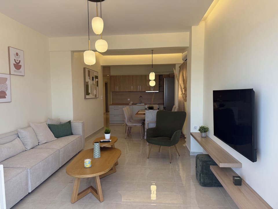 Apartment, Kitchen, Beach View | Living area | 50-inch Smart TV with digital channels