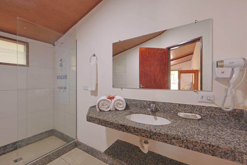 Hair dryer, towels, soap, shampoo