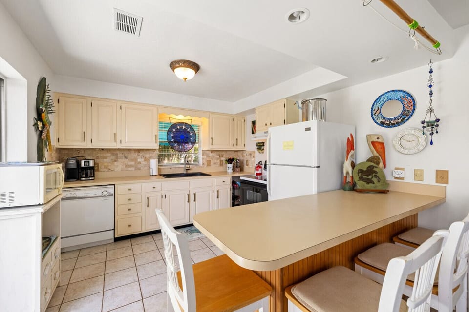 Open floor plan with full kitchen