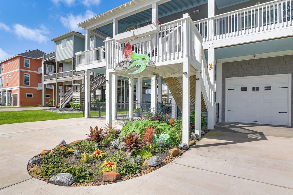 Property Exterior | 2-Story Home | Fenced-In Yard | Furnished Balconies