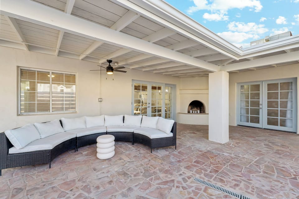 Ooh la la!  Sip your coffee or enjoy the evening with friends on this spacious patio with comfortable seating and shade.