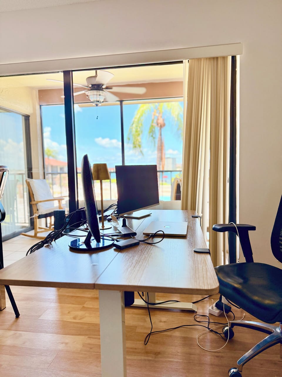 Work station w/ electric standing desk. Monitors + 1 docking station provided.