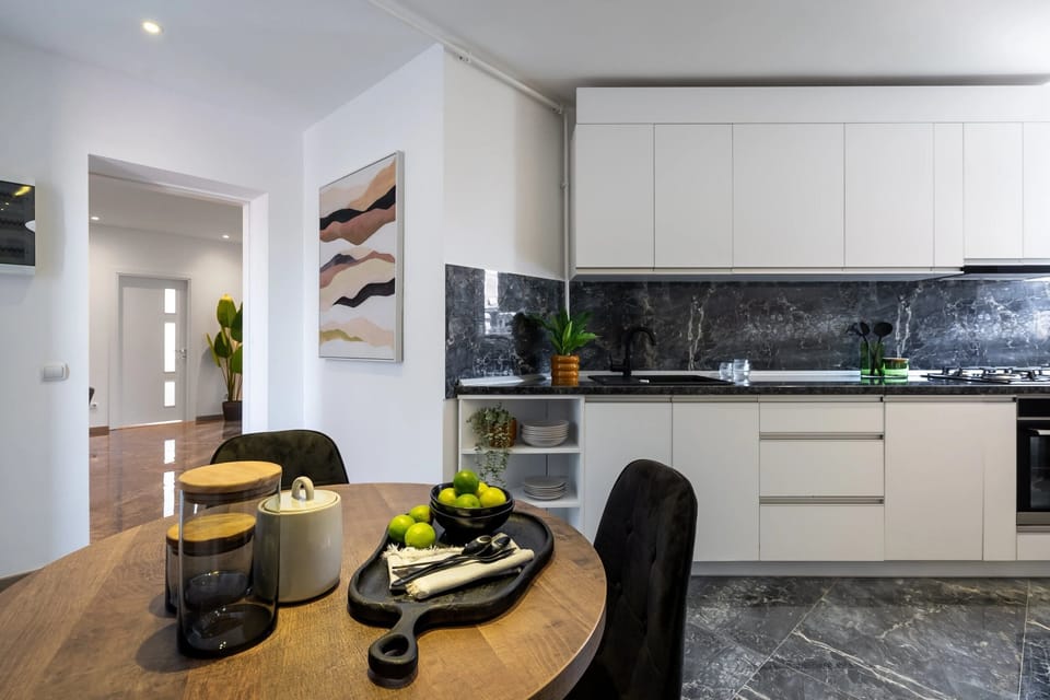 Deluxe Apartment, 3 Bedrooms, Balcony, City View | Private kitchen | Coffee/tea maker, electric kettle