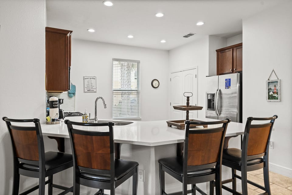 Kitchen view showing breakfast bar