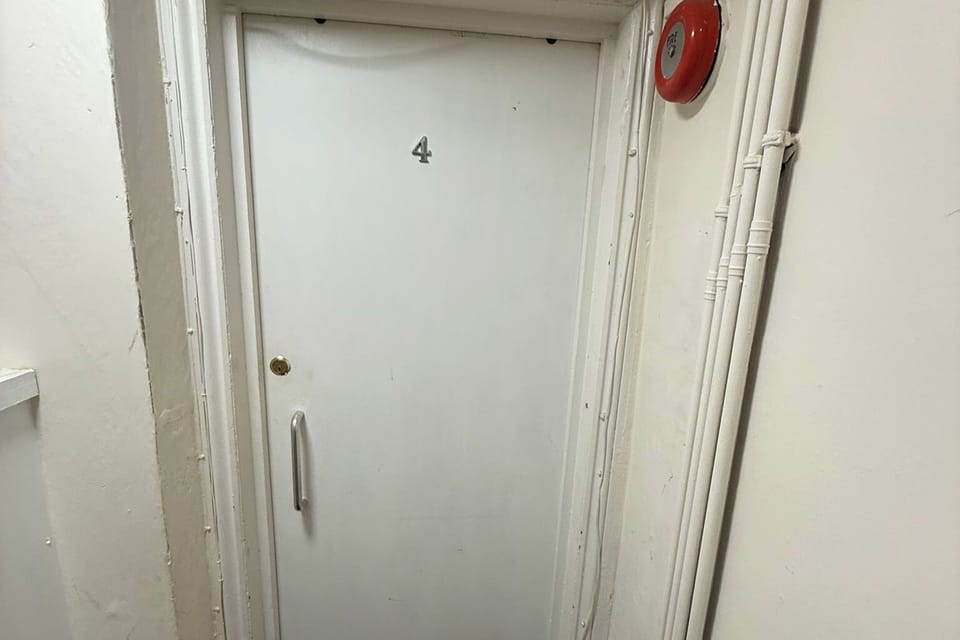 Flat 4 , 1 flight of stairs and door is in front of you