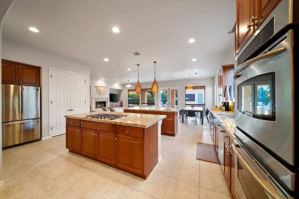 Fully equipped kitchen with large island and modern appliances