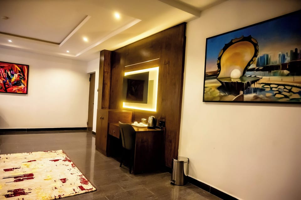 Luxury Suite, City View | Living area | Smart TV, Netflix, streaming services