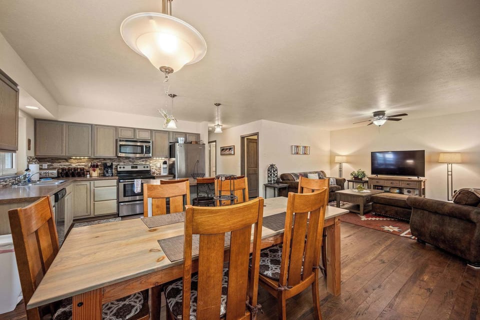 Your open-concept space seamlessly blends kitchen, dining, and living areas for effortless entertaining and relaxation.