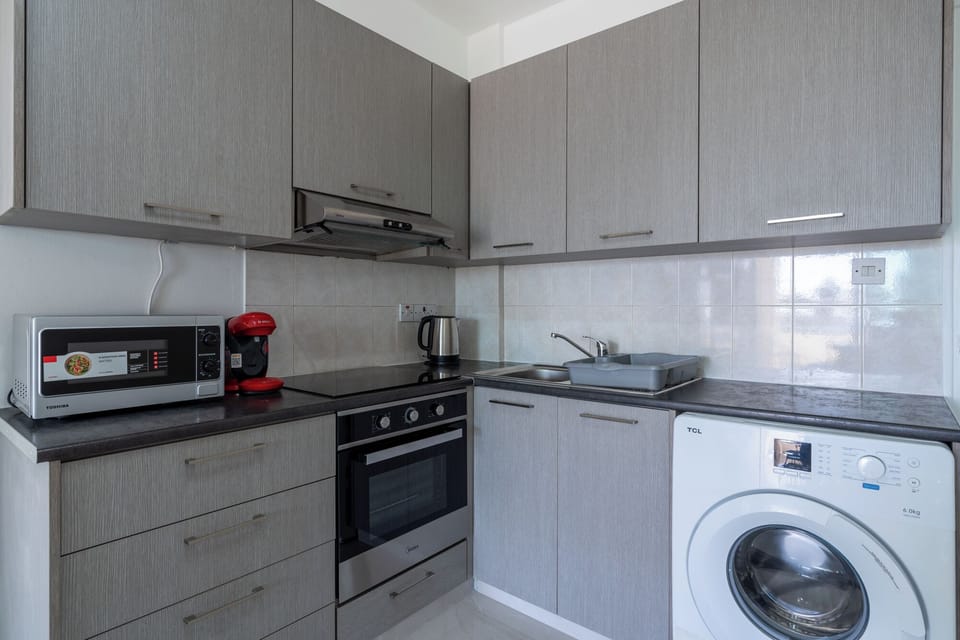 Apartment, 3 Bedrooms, Kitchen, Sea View | Private kitchen | Espresso maker, coffee/tea maker, full-size fridge, microwave