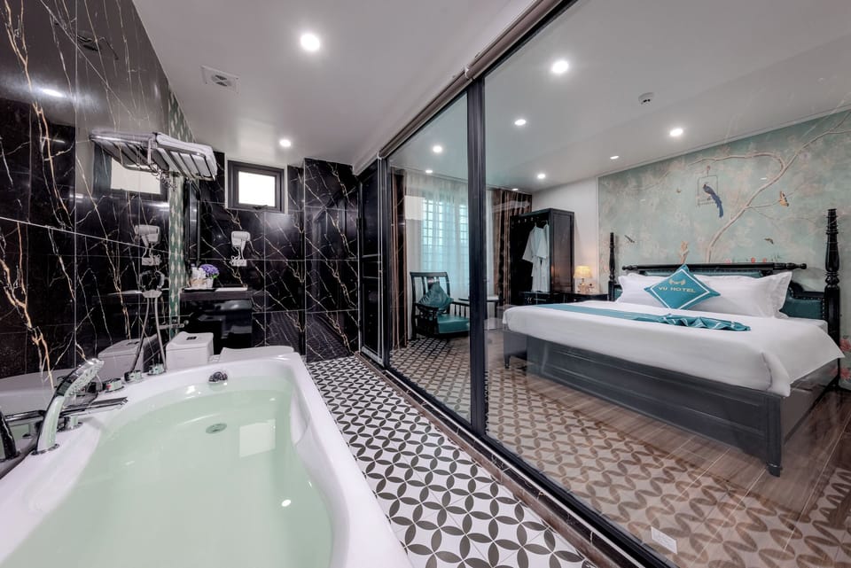 Deluxe Double Room, Bathtub | Minibar, desk, laptop workspace, blackout drapes
