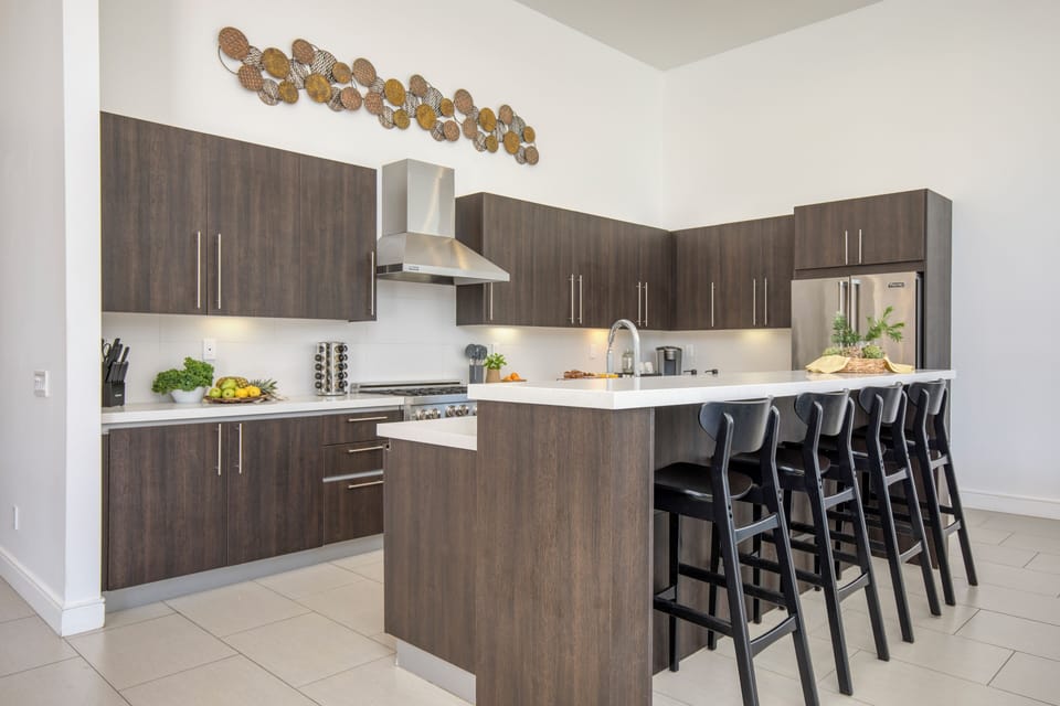 Chef's kitchen with barstool seating. (Polo Villa 1)