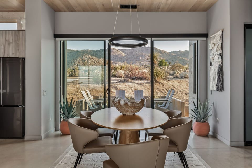 Dining area opens up to the fire pit.