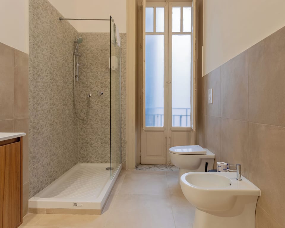 Family Quadruple Room | Bathroom | Hair dryer, bidet, towels, soap