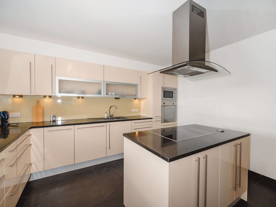 Kitchen, Kitchen Appliance, Countertop, Flooring, Interior Design, Cabinetry, Major Appliance, Wood, Light Fixture, Ceiling