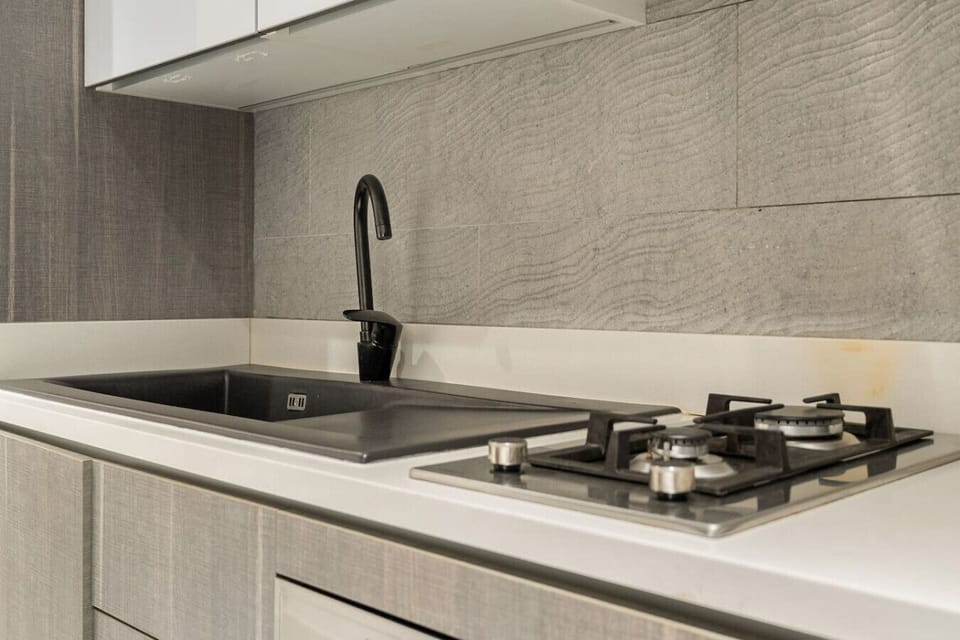 Kitchen: Sleek design meets modern convenience for culinary adventures in Dubai!