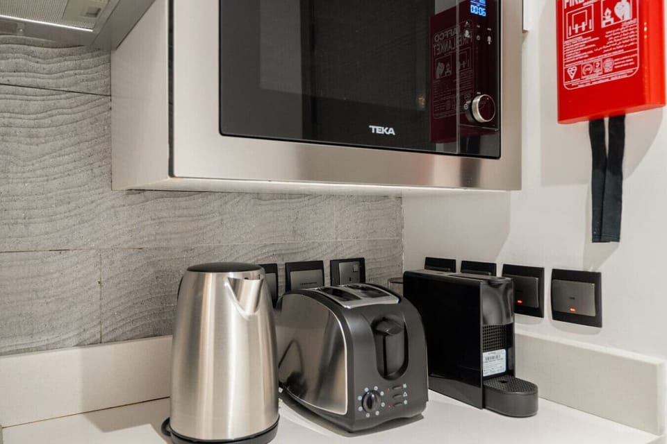 Kitchenette: Modern appliances await your culinary adventures in this stylish space!