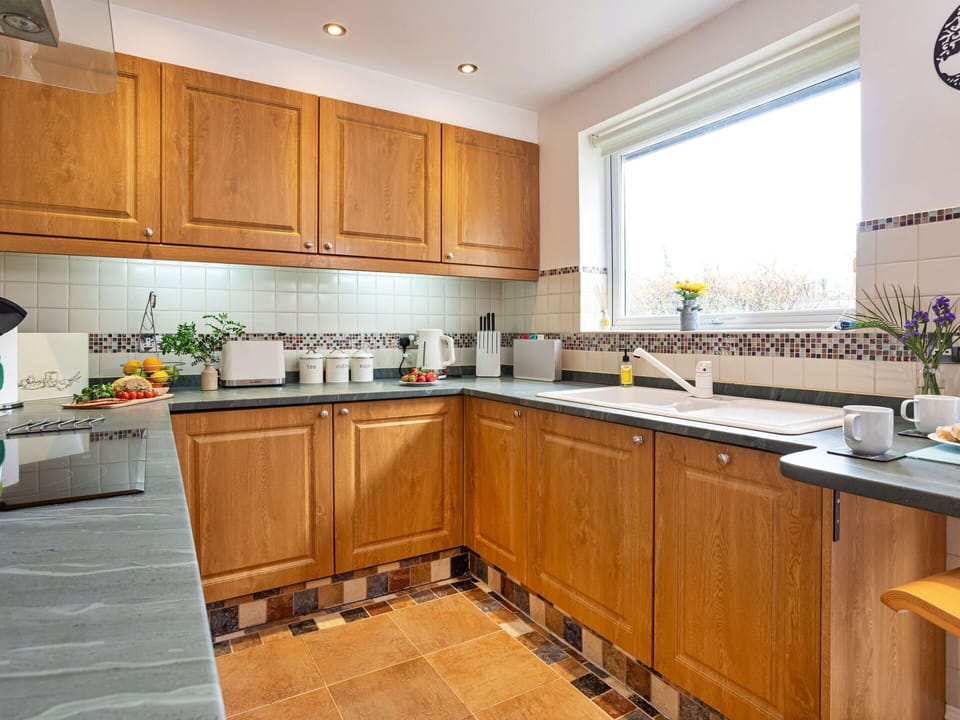 Kitchen, Countertop, Cabinetry, Flooring, Kitchen Appliance, Interior Design, Major Appliance, Wood, Floor, Kitchen Sink