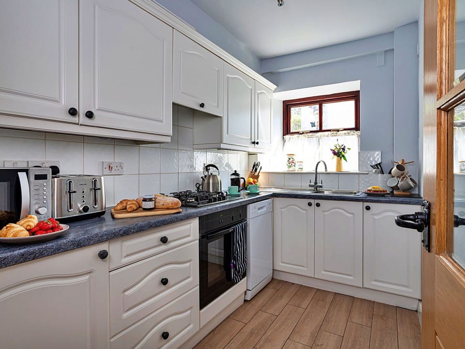 Kitchen Appliance, Kitchen, Countertop, Cabinetry, Major Appliance, Interior Design, Home Appliance, Furniture, Kitchen Stove, Kitchen Sink