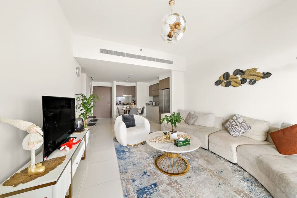 Living Room: Enjoy stylish gatherings surrounded by modern decor and vibrant touches!