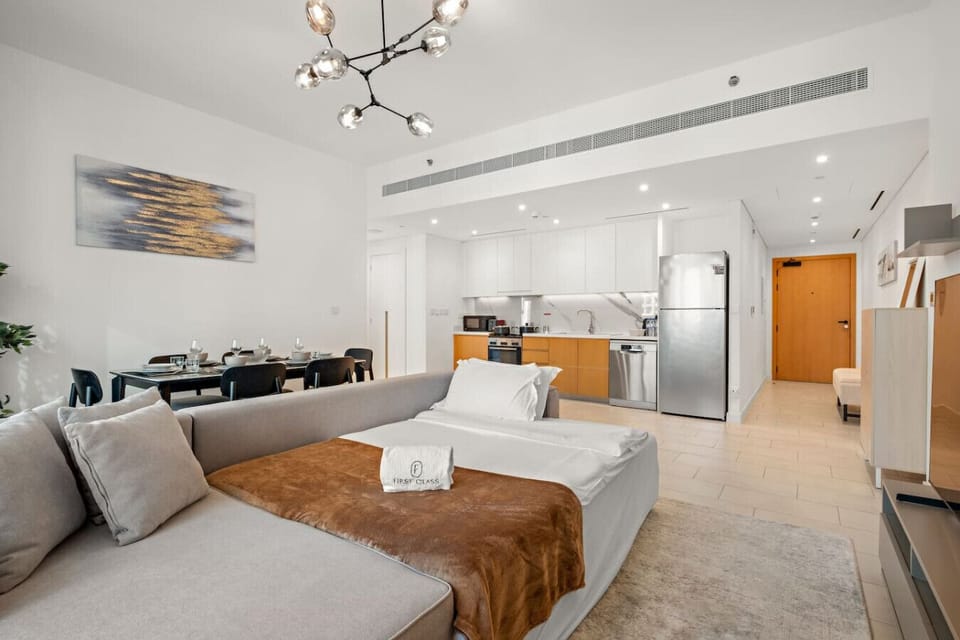 Living Room: Modern open space with stylish decor and a sleek kitchen for effortless entertaining!