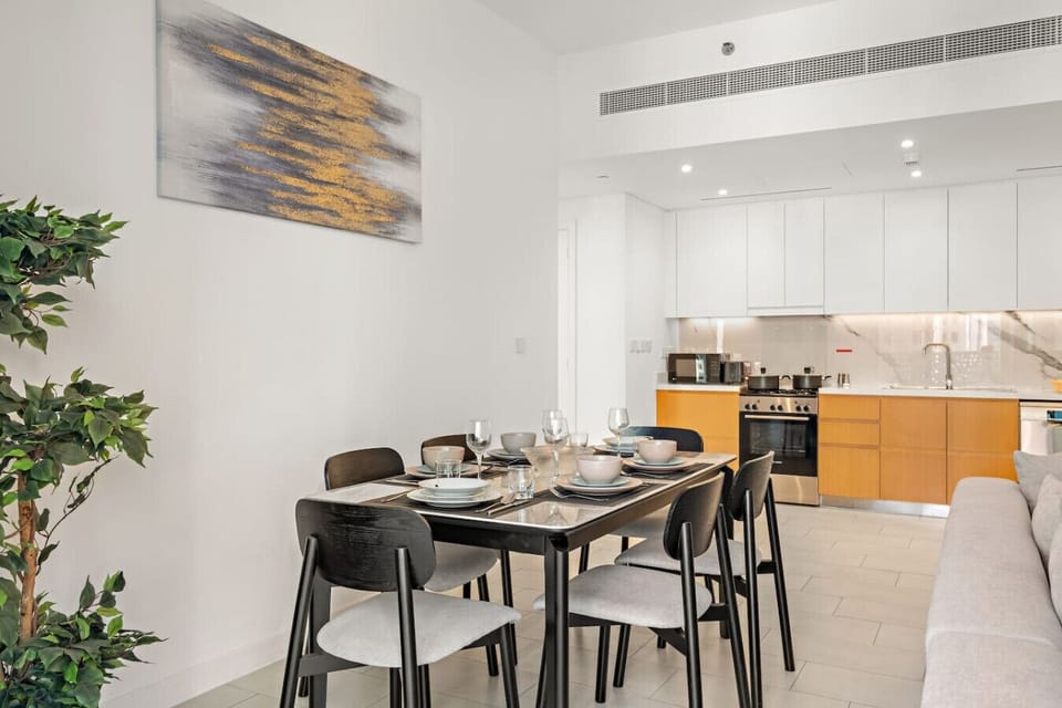 Dining Area: Enjoy delightful meals in a stylish space with modern decor and ample natural light!