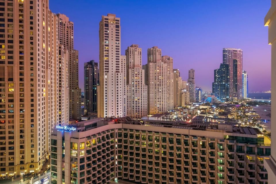 Spectacular Skyline View: Unwind with breathtaking city lights and vibrant nightlife at your doorstep!