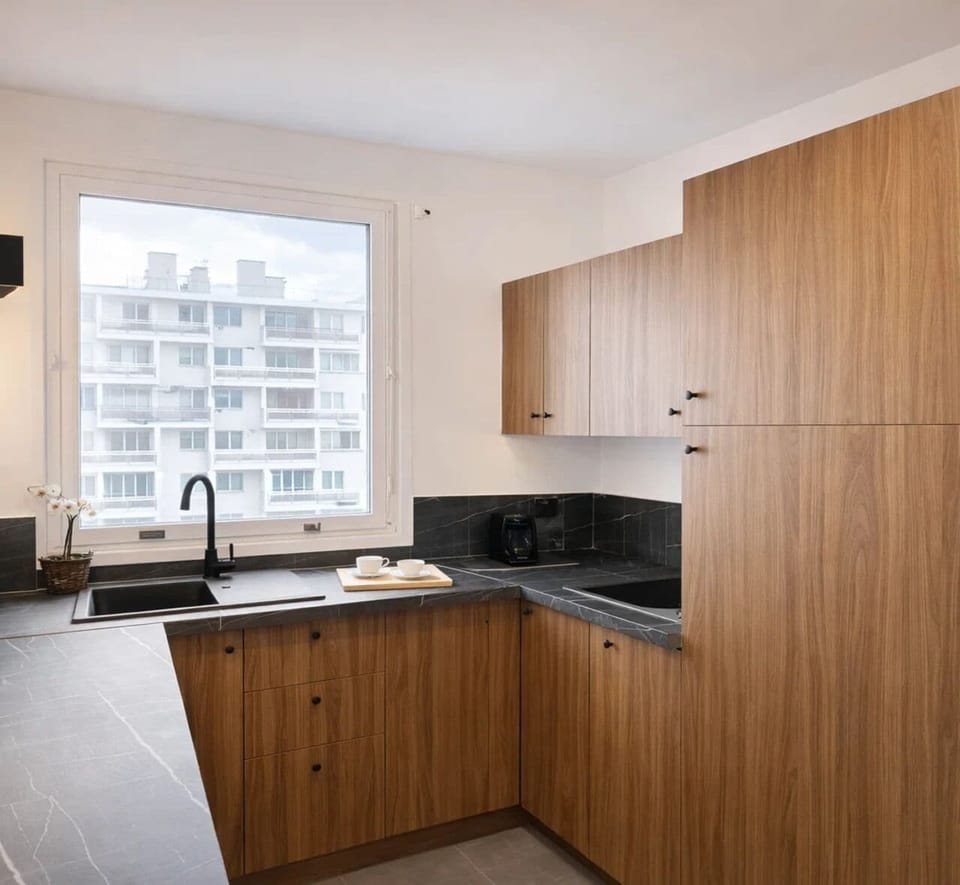 Family Apartment, Courtyard View | Private kitchen | Espresso maker, electric kettle, toaster
