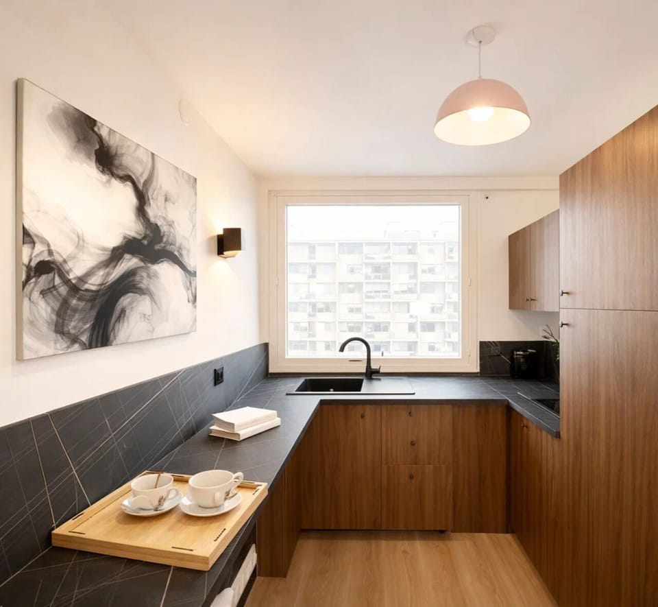 Family Apartment, Courtyard View | Private kitchen | Espresso maker, electric kettle, toaster