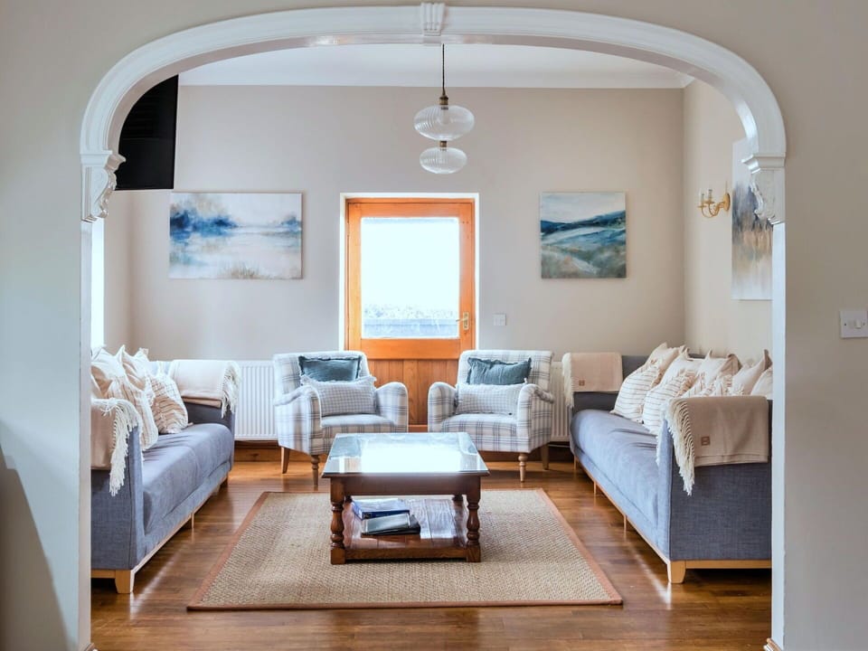 Furniture, Interior Design, Wall, Couch, Flooring, Wood, Floor, Living Room, Lighting, Home