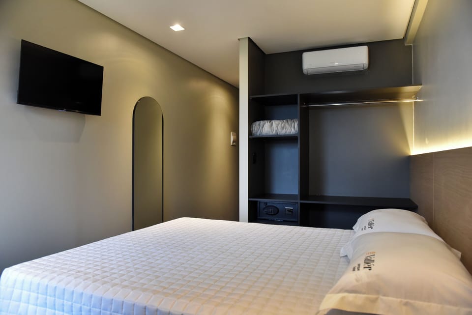 Desk, laptop workspace, free WiFi, bed sheets