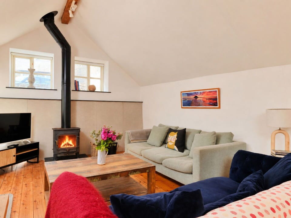 Furniture, Flooring, Interior Design, Wood, Floor, Hearth, Room, Couch, Living Room, Ceiling
