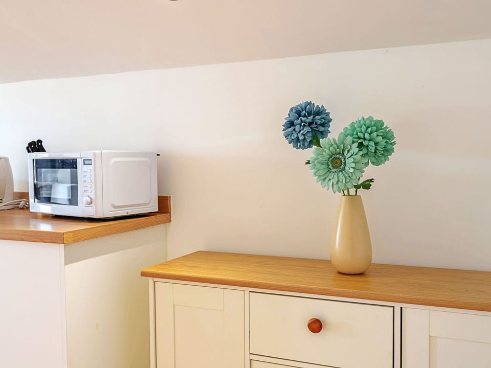 Furniture, Interior Design, Wood, Flooring, Cabinetry, Floor, Room, Drawer, Lighting, Home