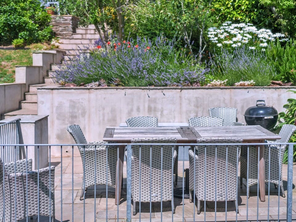 Furniture, Outdoor Furniture, Shrub, Chair, Garden, Outdoor Table, Composite Material, Groundcover, Shade, Backyard
