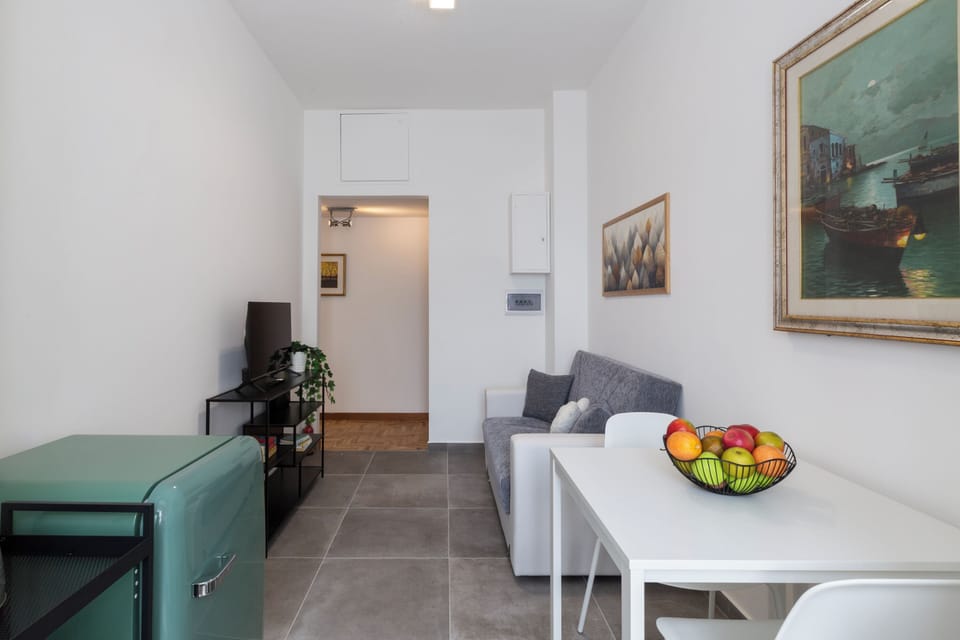 Comfort Apartment, Balcony | Living area | 32-inch Smart TV with digital channels