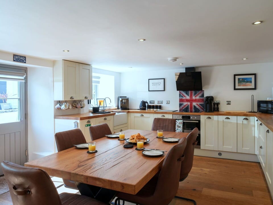 Furniture, Interior Design, Flooring, Wood, Cabinetry, Ceiling, Floor, Kitchen & Dining Room Table, Kitchen, Countertop