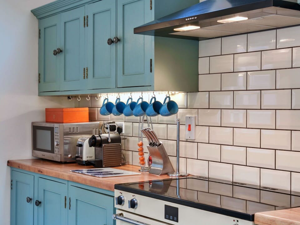 Kitchen, Kitchen Appliance, Countertop, Cabinetry, Interior Design, Furniture, Major Appliance, Flooring, Drawer, Home Appliance