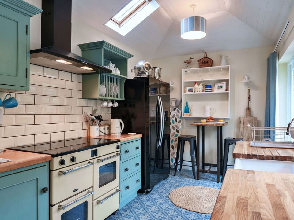 Kitchen Appliance, Kitchen, Furniture, Interior Design, Major Appliance, Cabinetry, Countertop, Kitchen Stove, Flooring, Wood