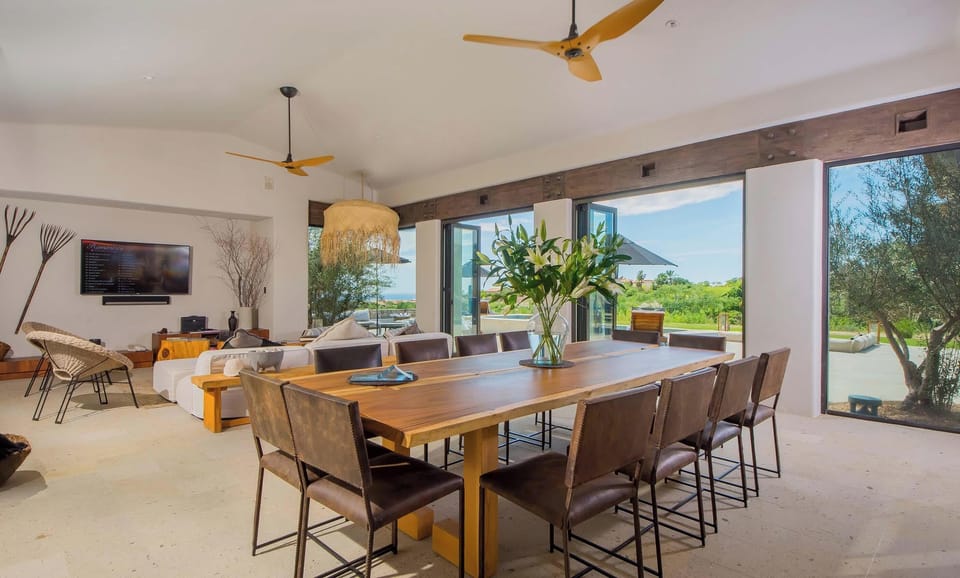 Host memorable dinners at this grand dining table, perfect for entertaining.