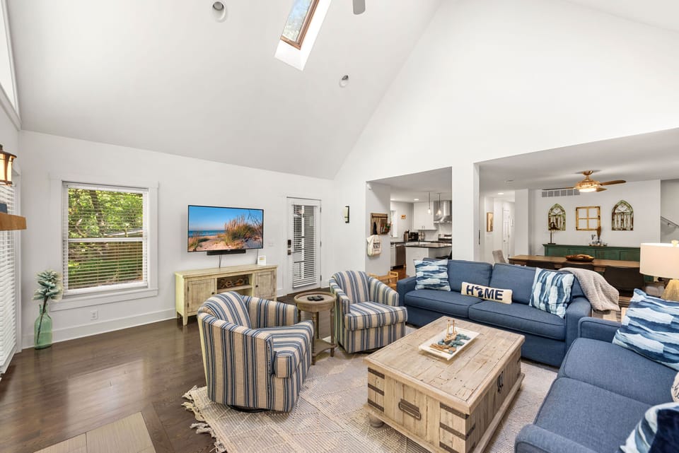 Cozy up beneath the vaulted ceiling glow.
