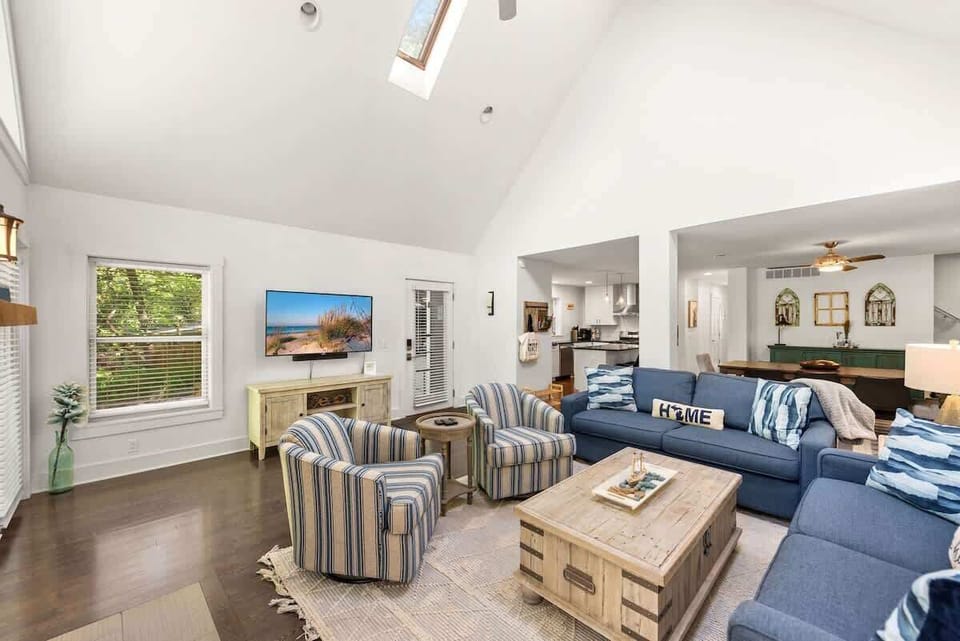 Cozy up beneath the vaulted ceiling glow.
