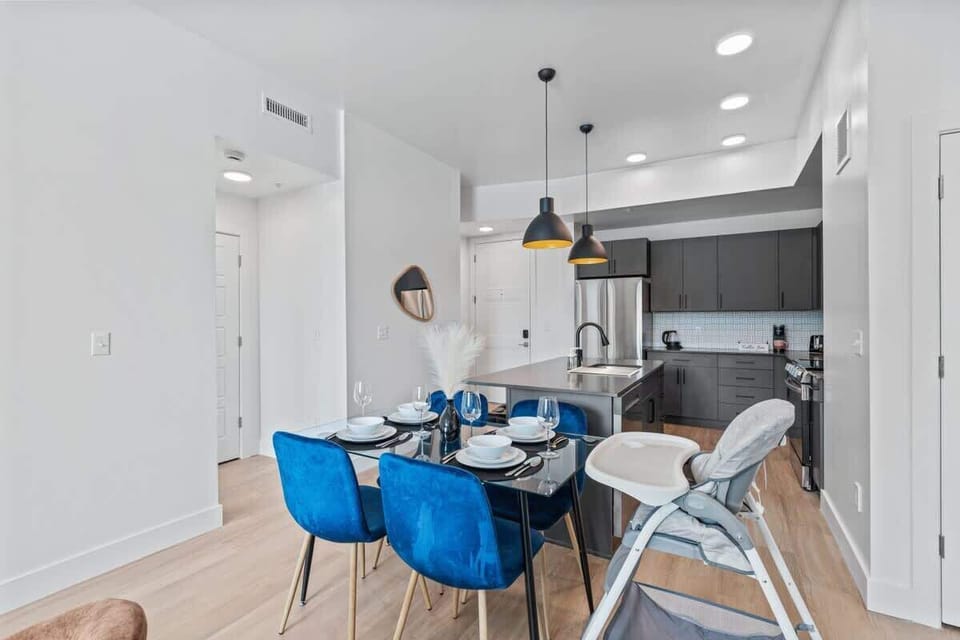 Dine in comfort at a chic four-person dining area just steps from the kitchen.