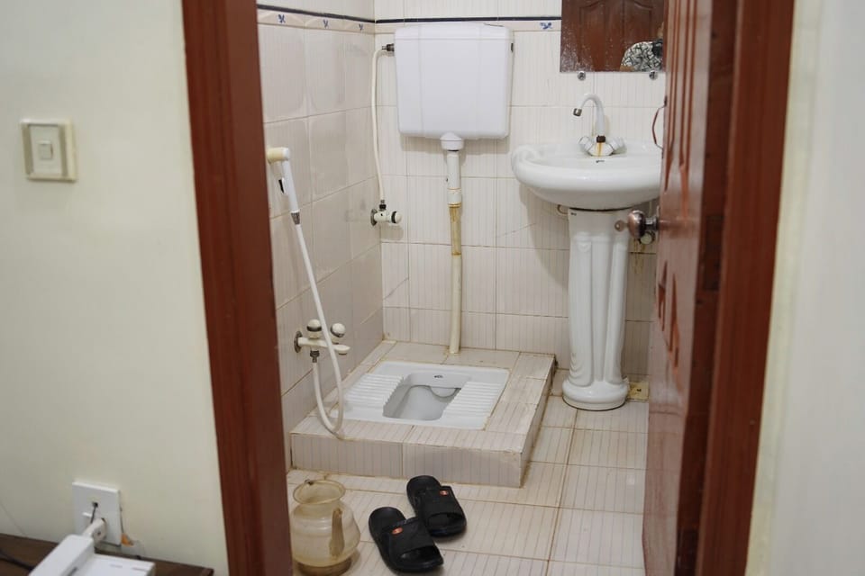 Raised toilet seat