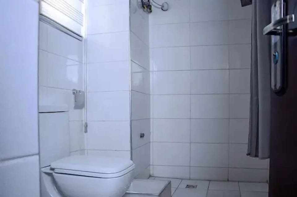 Family Room, Balcony, City View | Bathroom | Free toiletries, hair dryer, towels, soap